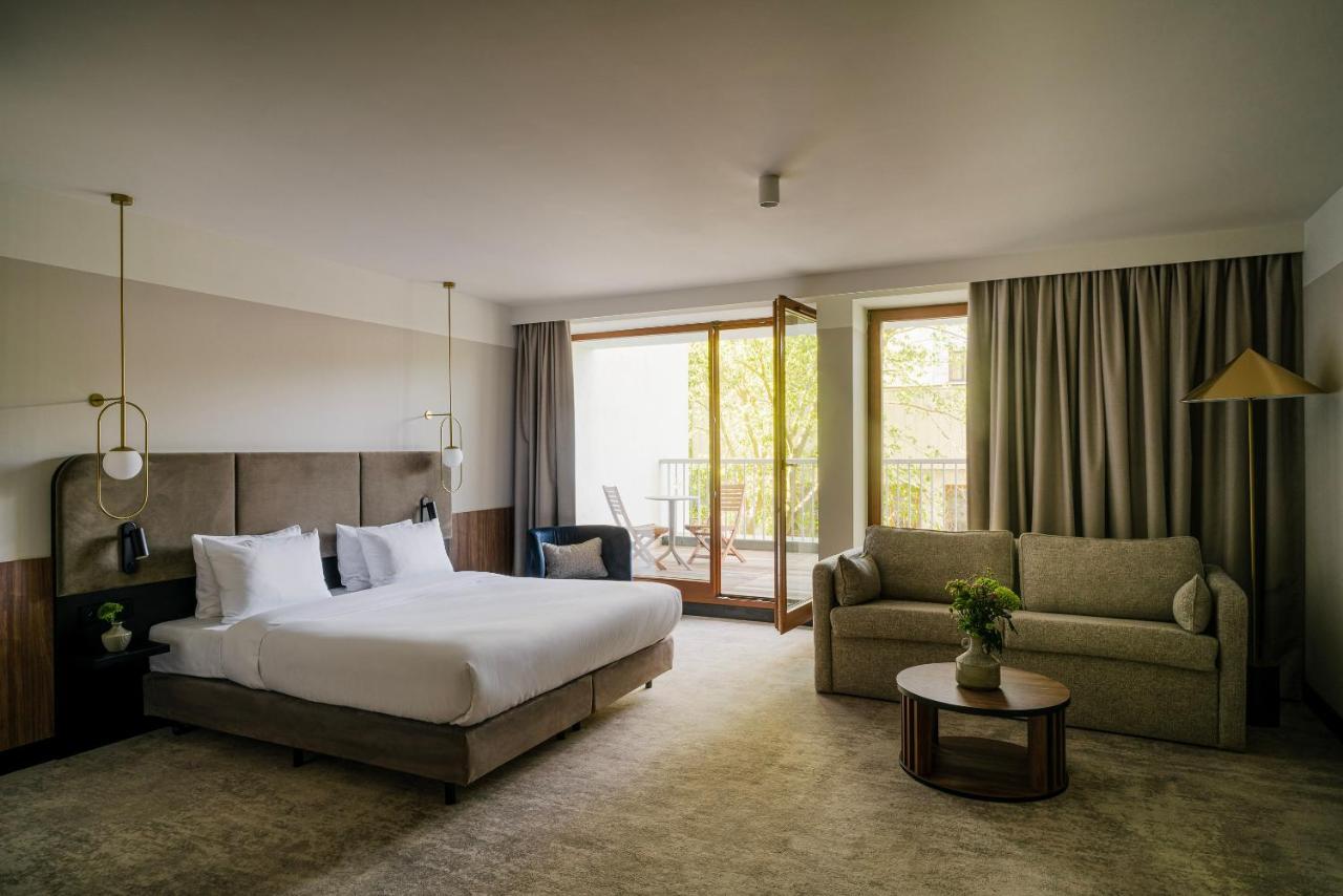 Royal Tulip Sand Колобжег Экстерьер фото A room at the hotel