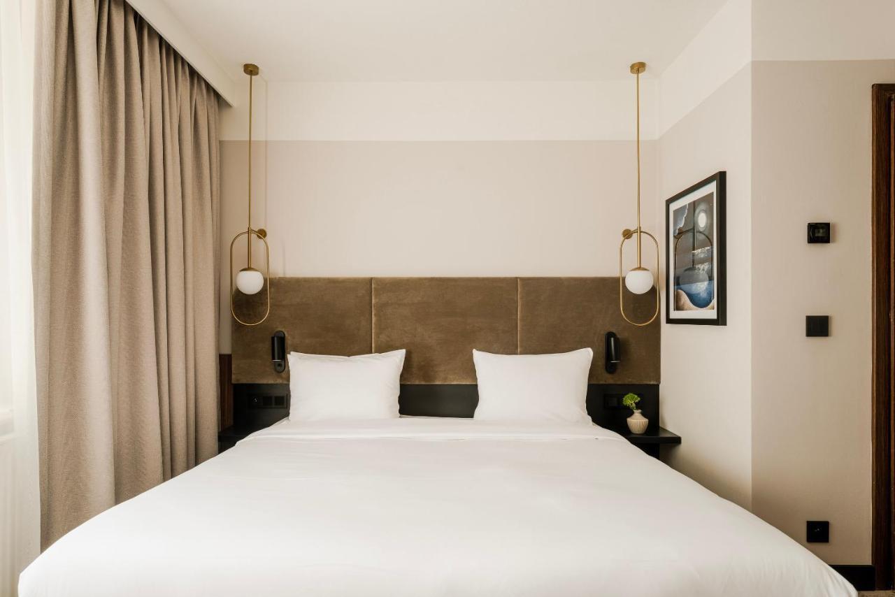 Royal Tulip Sand Колобжег Экстерьер фото A bedroom at the hotel
